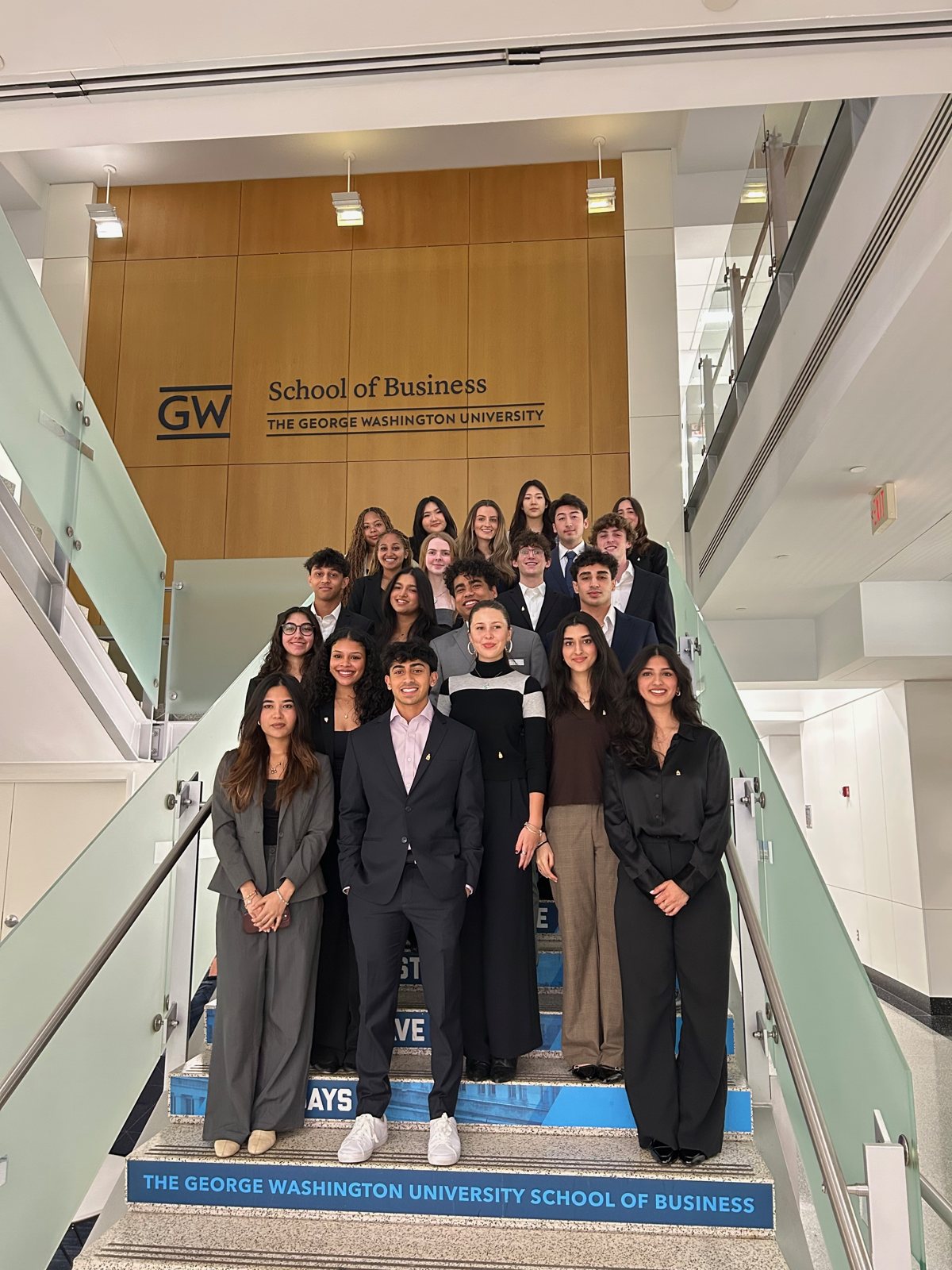 Brothers on the GW School of Business stairs